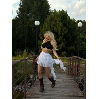 Ефектна спідниця з асиметричним воланом біла №597806